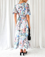 Celeste Floral V‑Neck Dress – Elegant Floral V‑Neck Dress with Flowing Silhouette