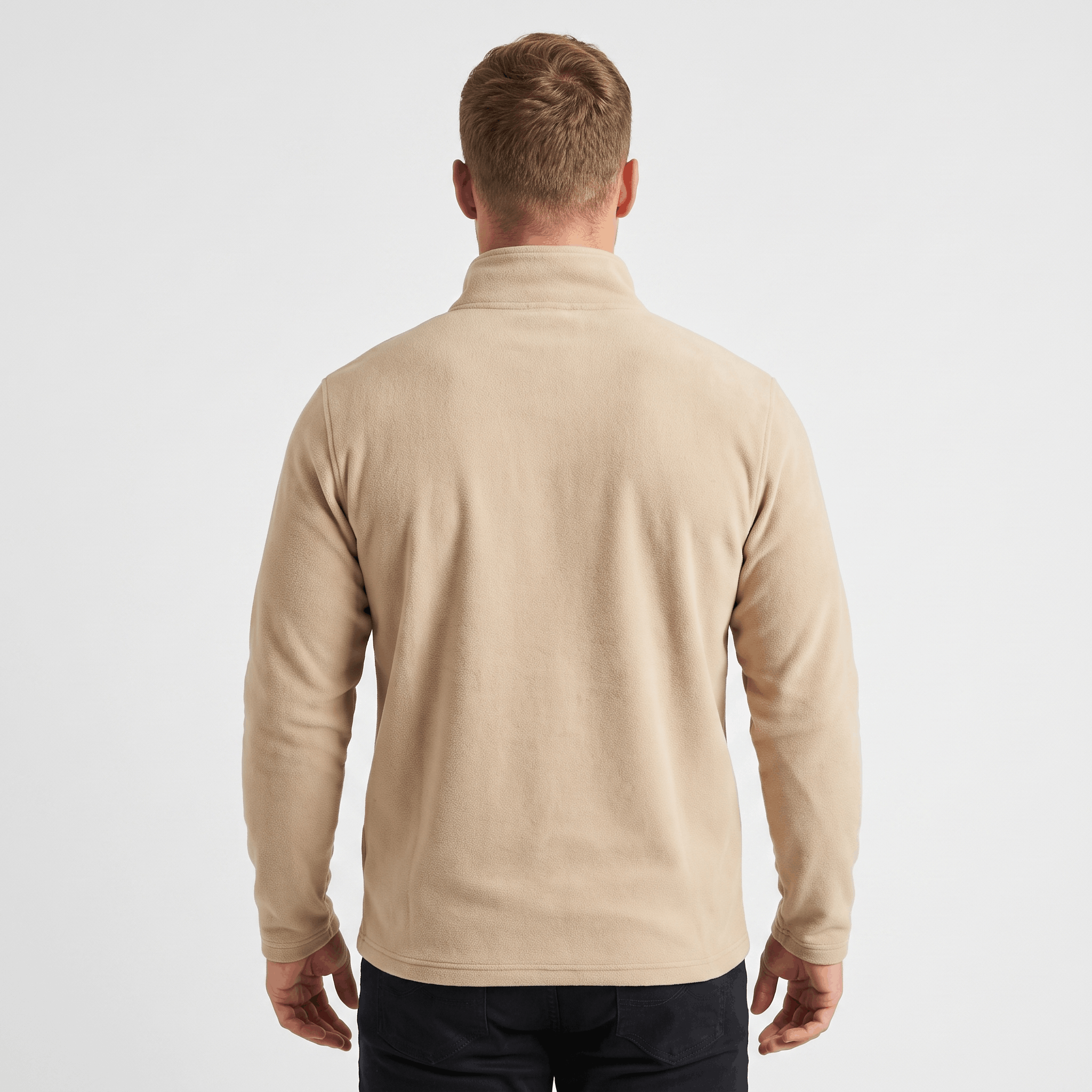 Back view of a men's beige quarter-zip knit sweater featuring a stand collar and ribbed hem.