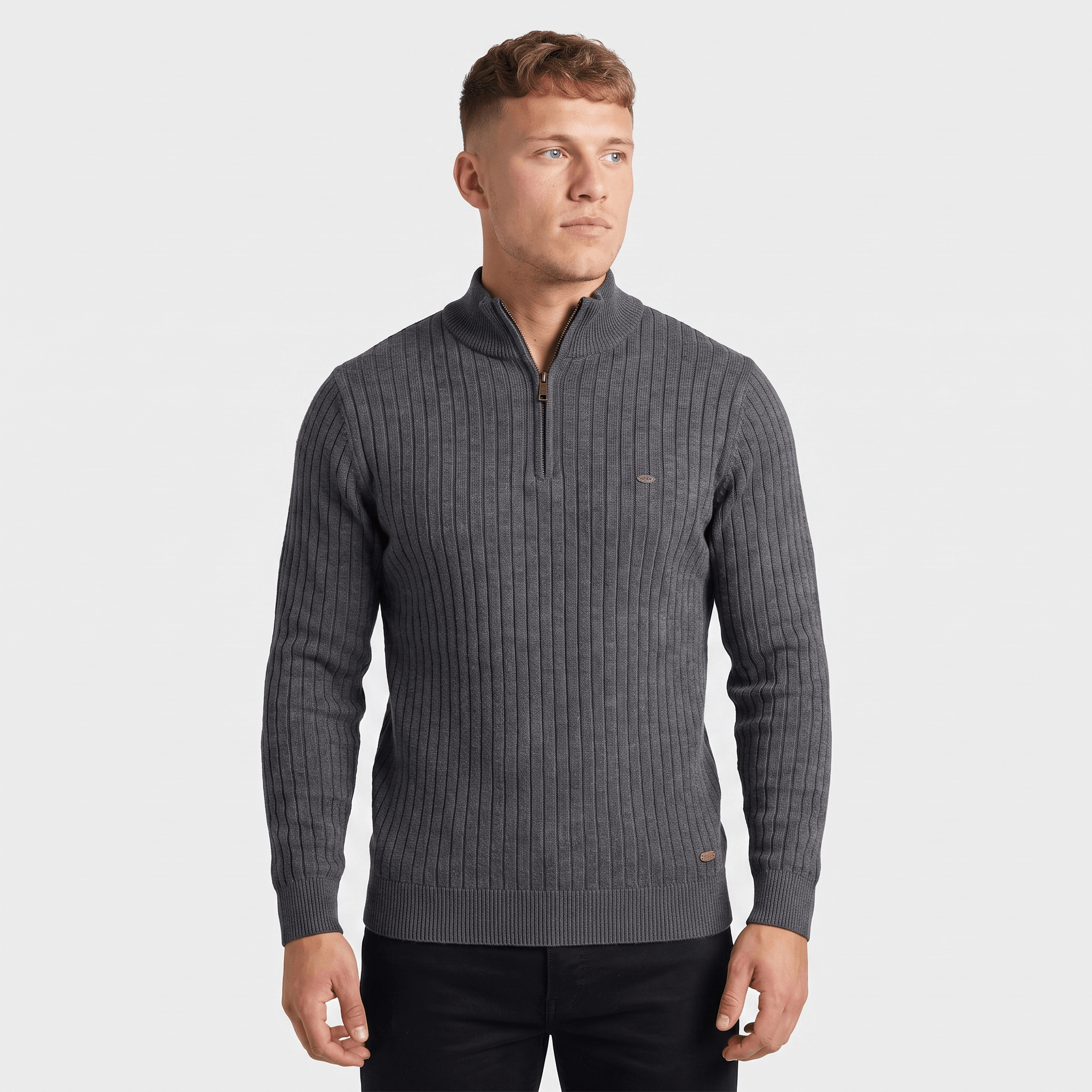 Man wearing a charcoal ribbed quarter-zip knit sweater with a stand collar, long sleeves, and a modern slim fit.