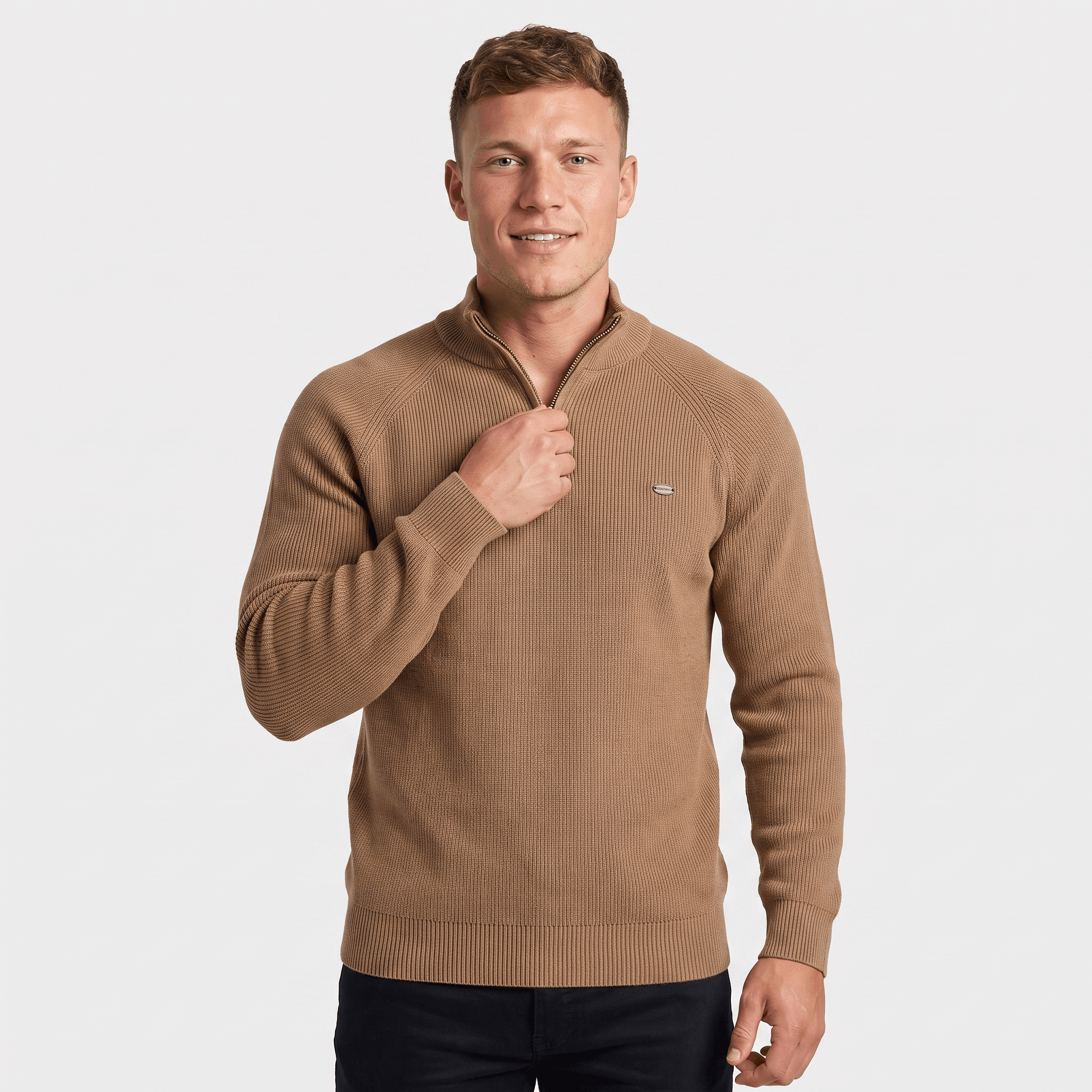 Man wearing a camel ribbed quarter-zip knit sweater with a stand collar, long sleeves, and a classic fit.