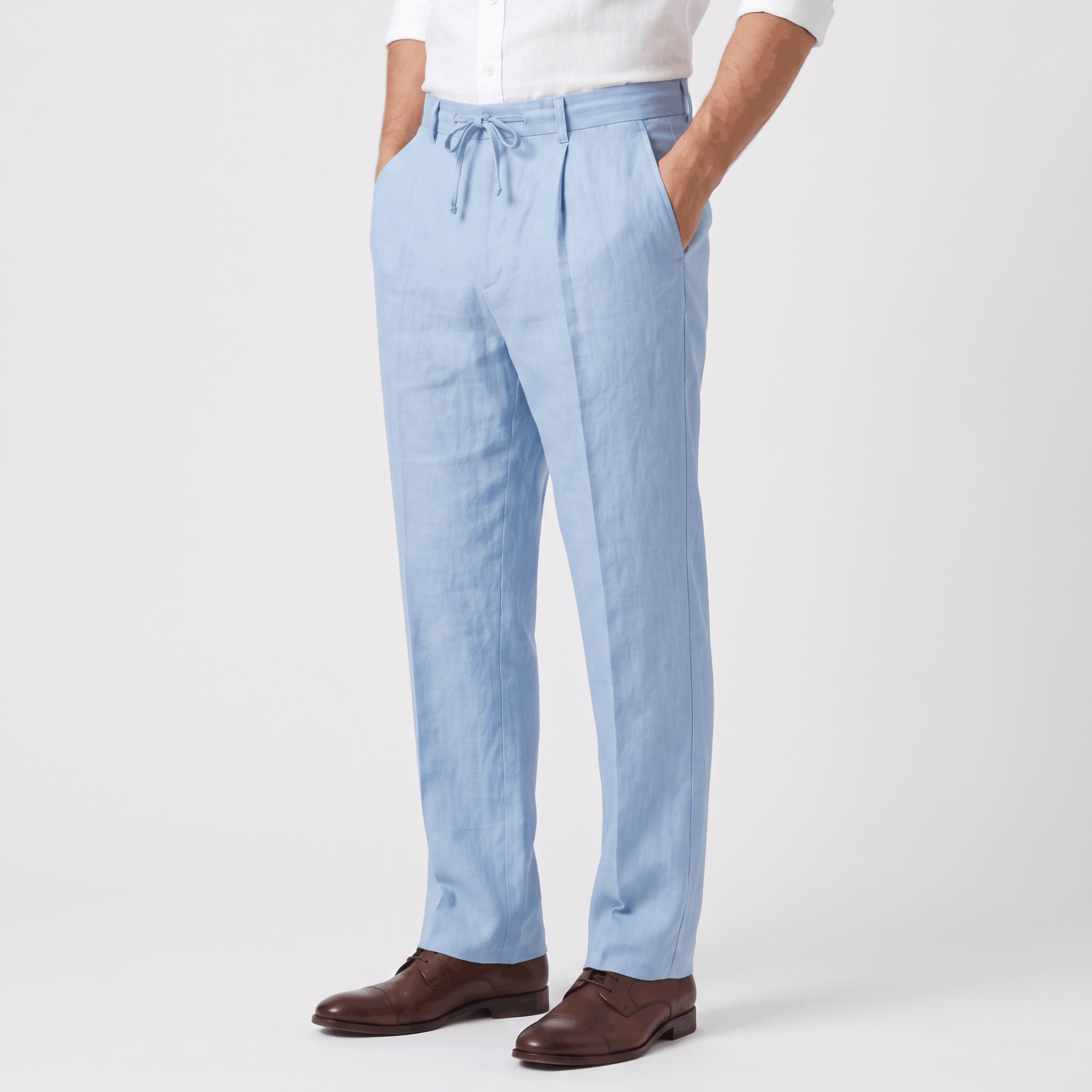 Side view of men's light blue linen drawstring pants featuring a straight-leg silhouette and breathable linen fabric.