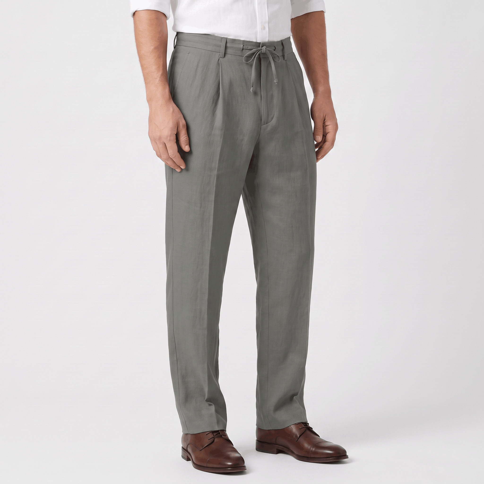 Side view of men's gray linen drawstring pants featuring a relaxed straight-leg silhouette, elastic waistband, and breathable linen fabric.