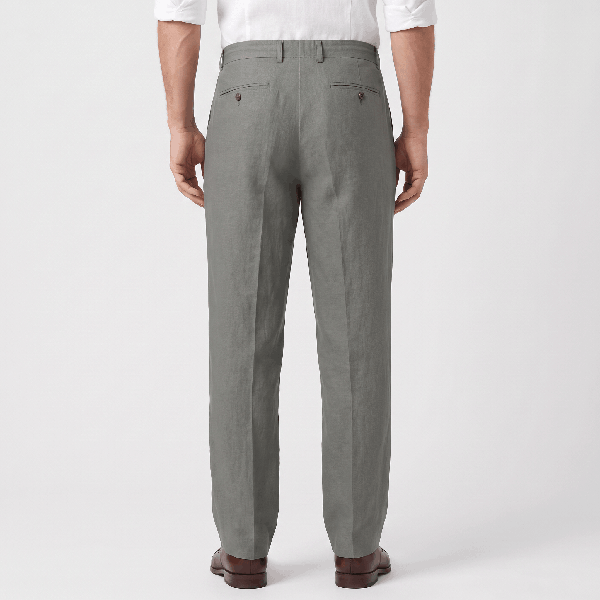 Back view of men's gray linen drawstring pants with an elastic waistband, relaxed fit, and lightweight linen construction.