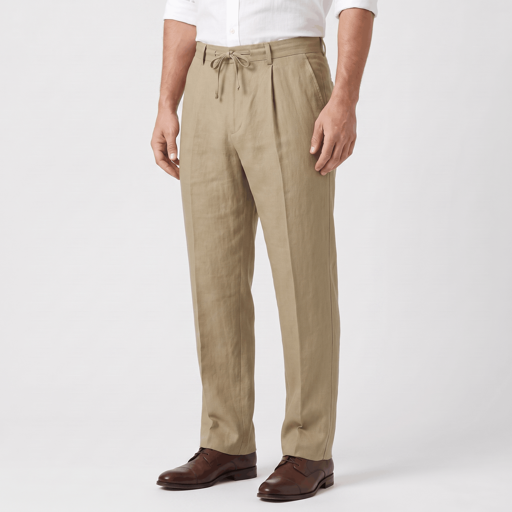 Side view of men's khaki linen drawstring pants featuring a relaxed silhouette and lightweight linen fabric.