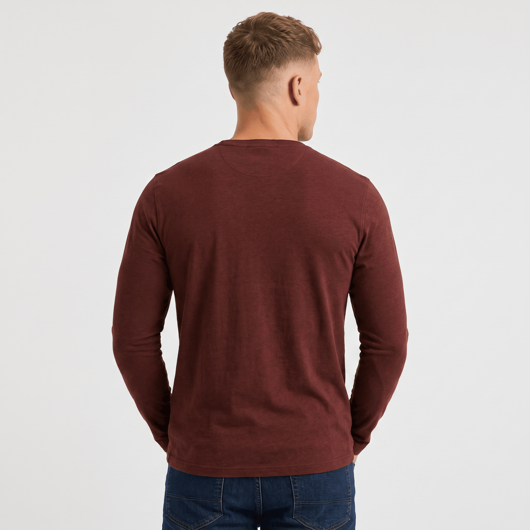 Back view of a men's burgundy long-sleeve Henley shirt with a classic fit and clean minimalist design.
