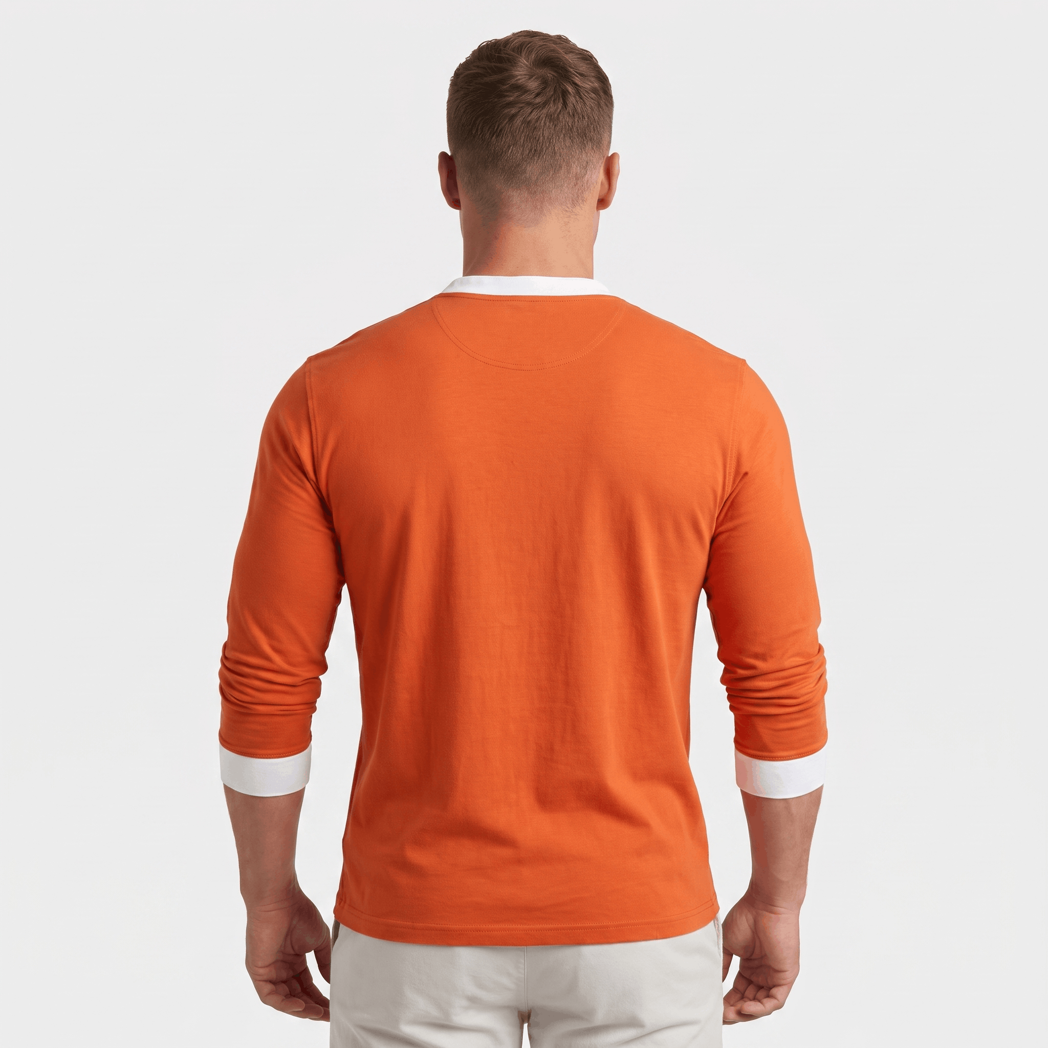 Back view of a men's orange long-sleeve Henley sweater with white contrast cuffs, ribbed hem, and a clean minimalist design.