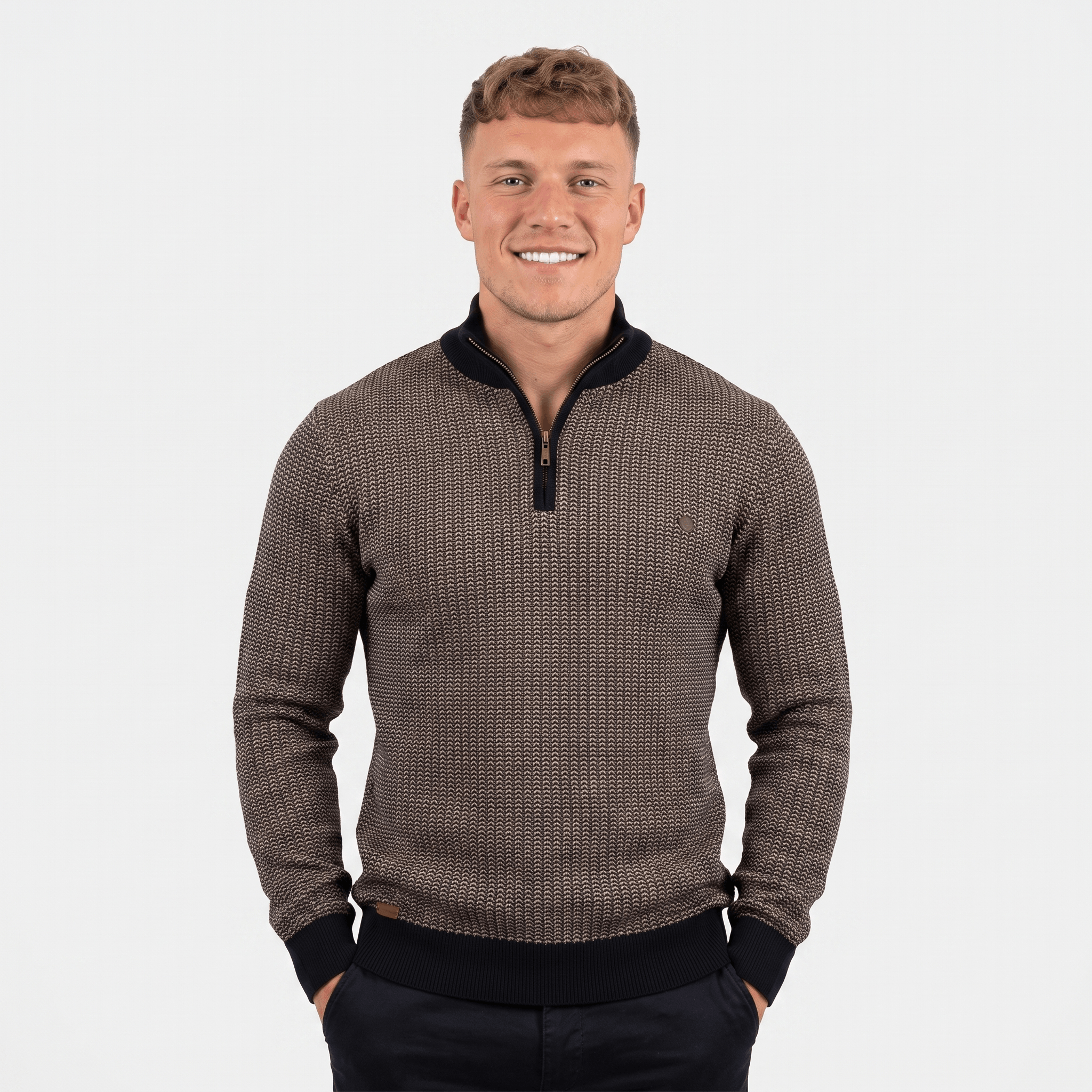 Man wearing a brown textured quarter-zip knit sweater with a stand collar, long sleeves, and a modern slim fit.