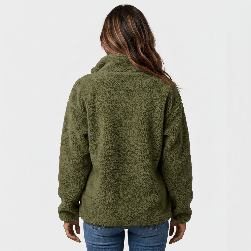 Back view of a woman wearing an olive green textured fleece jacket with a relaxed silhouette and long sleeves.