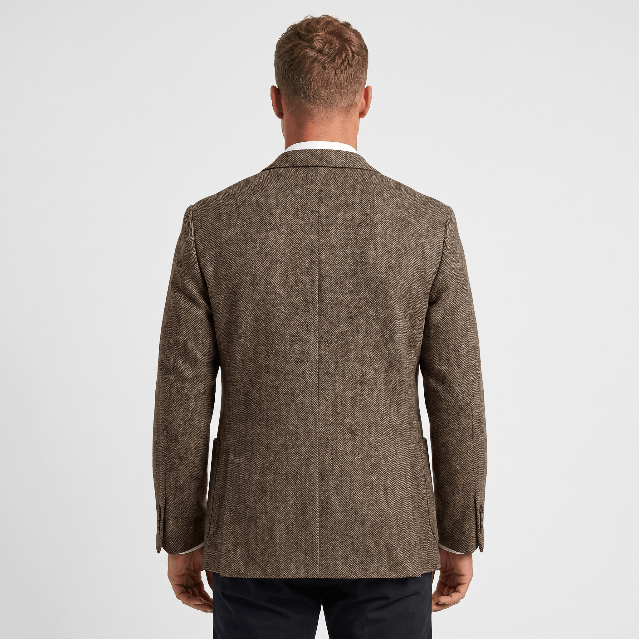 Back view of a men's brown tweed blazer featuring a textured fabric and classic tailored construction.