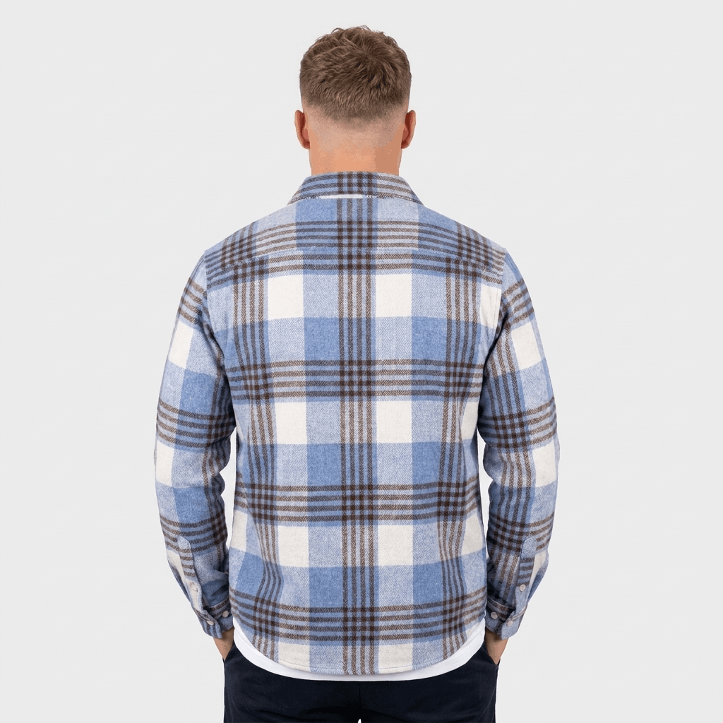 Back view of a man wearing a blue and white plaid overshirt jacket with a relaxed fit.
