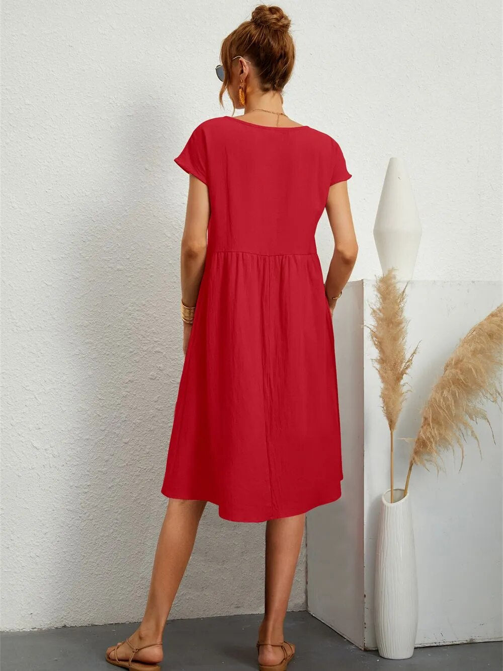 Nora Black Midi Dress – Luxurious Fabric with Flattering Fit for Wedding Guests 1