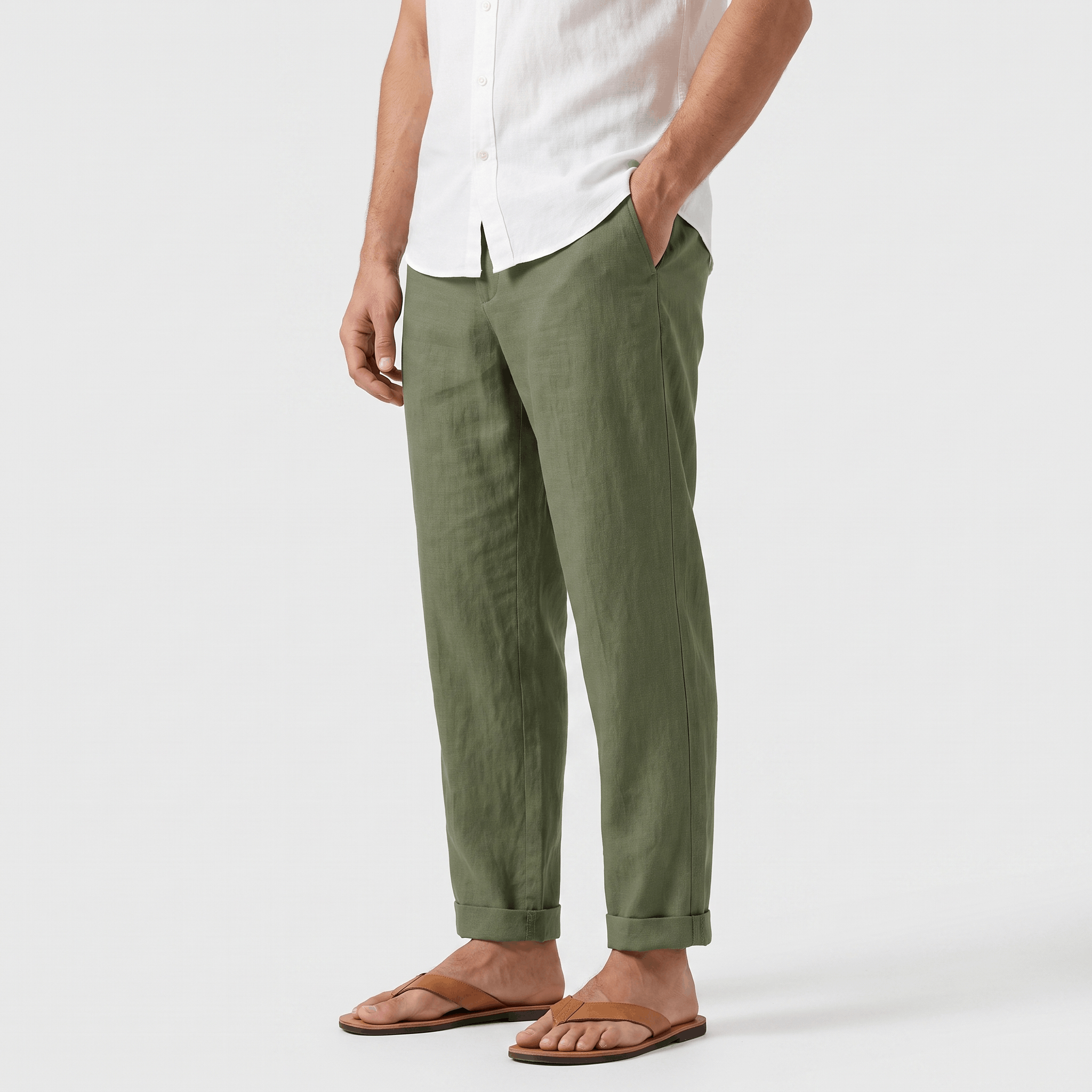 Side view of men's olive green linen pants featuring a tailored straight-leg silhouette and side pockets.