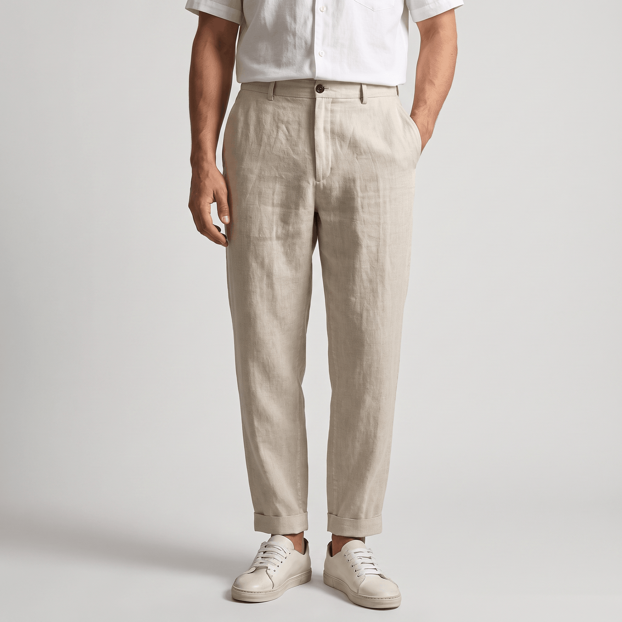 Men's light beige linen pants with a straight-leg fit, belt loops, and classic tailored design.