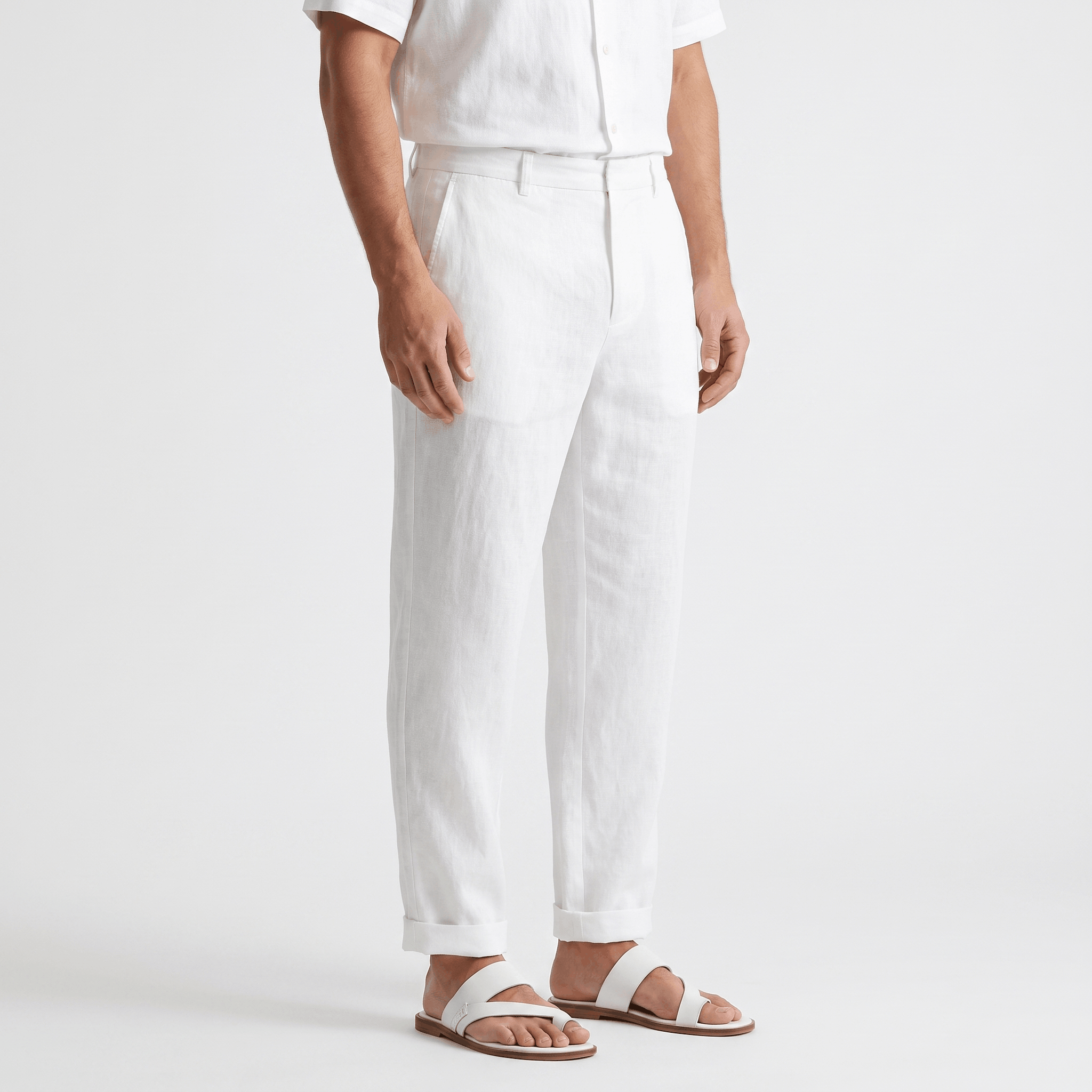 Side view of men's white linen pants with a classic straight-leg silhouette and breathable linen fabric.