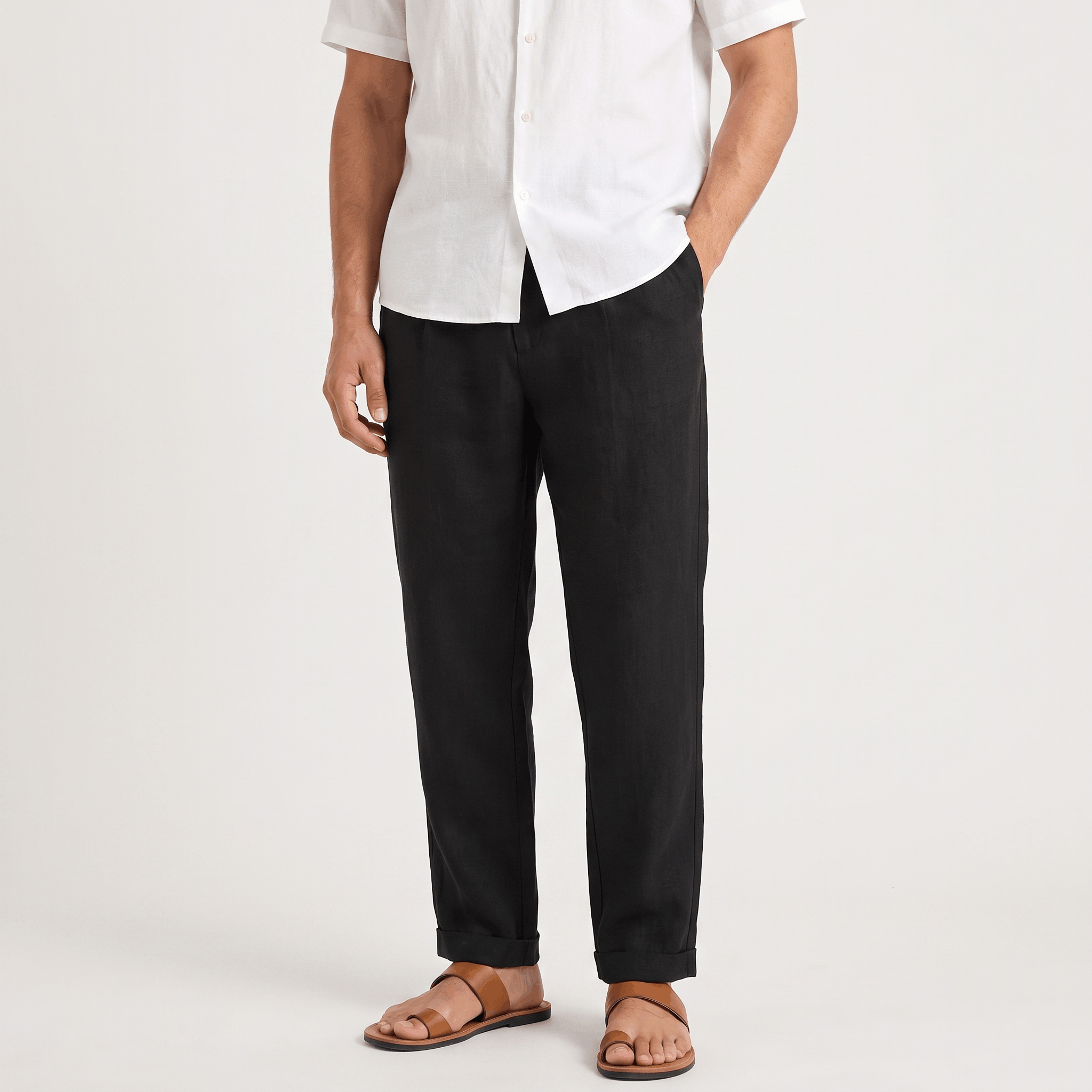 Men's black linen pants with a straight-leg fit, button closure, belt loops, and side pockets.