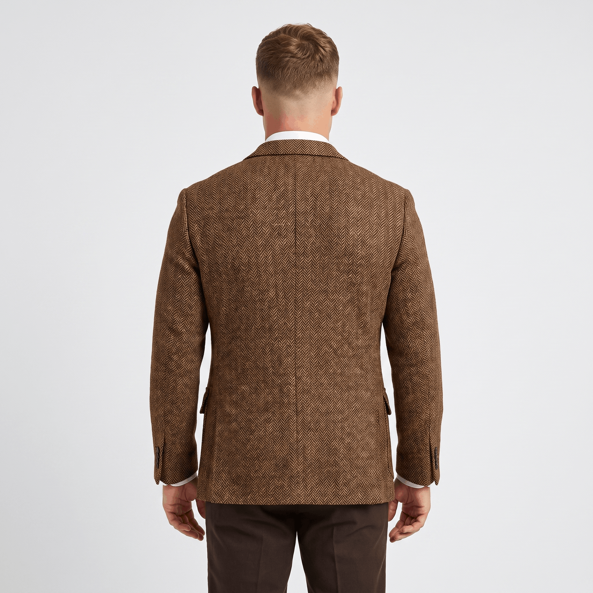 Back view of a men's brown tweed blazer featuring a tailored fit, textured fabric, and classic blazer construction.