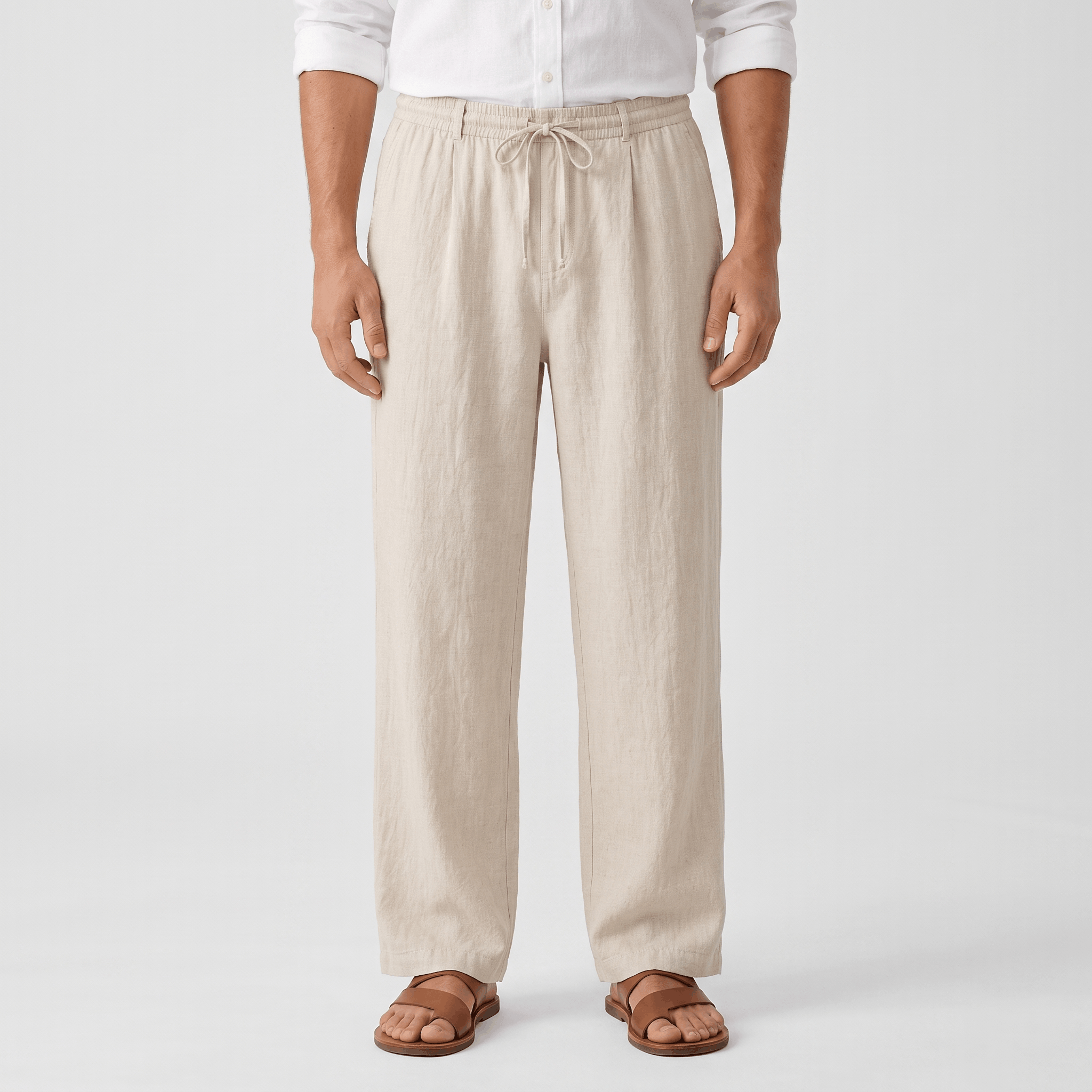 Men's cream linen drawstring pants with a relaxed straight-leg fit, elastic waistband, and side pockets.