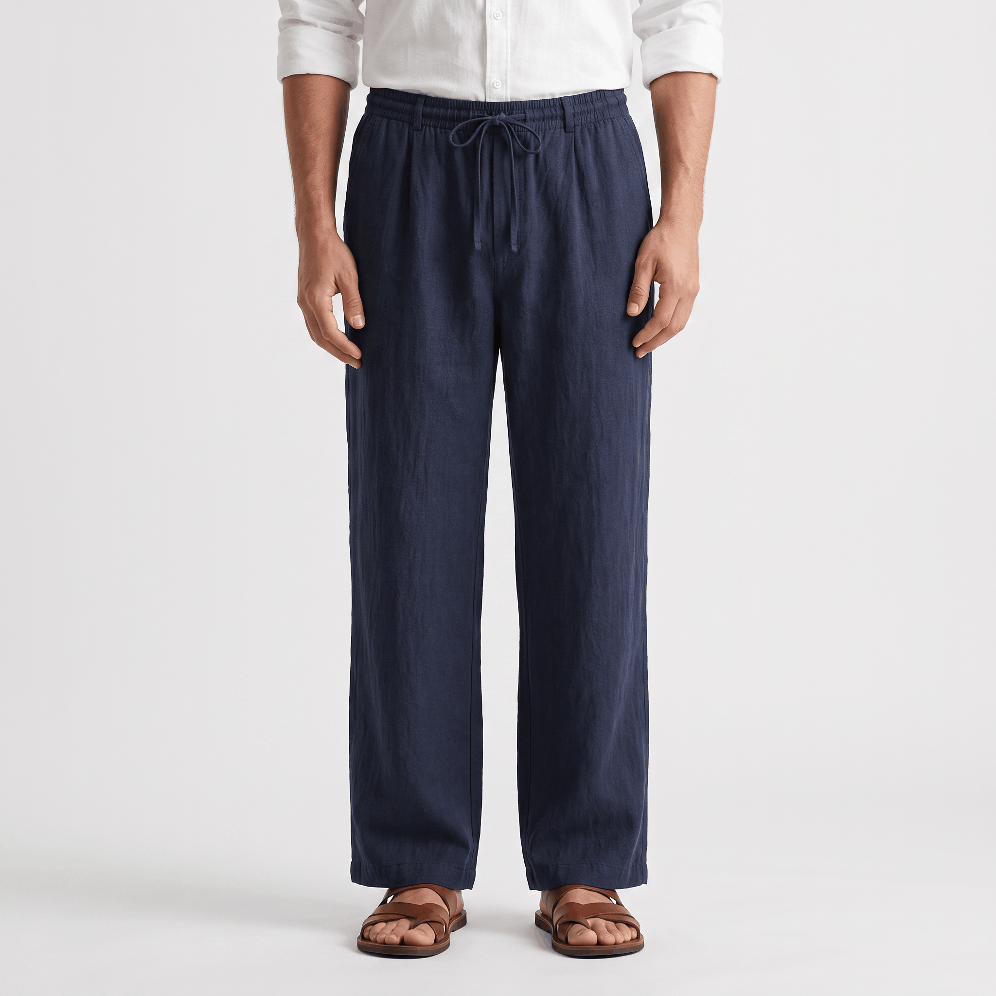 Men's navy linen drawstring pants with a relaxed straight-leg fit, elastic waistband, and lightweight linen fabric.