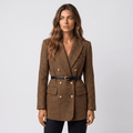 Woman wearing a brown double-breasted tweed blazer with gold-tone buttons, notched lapels, flap pockets, belted waist, and tailored silhouette.