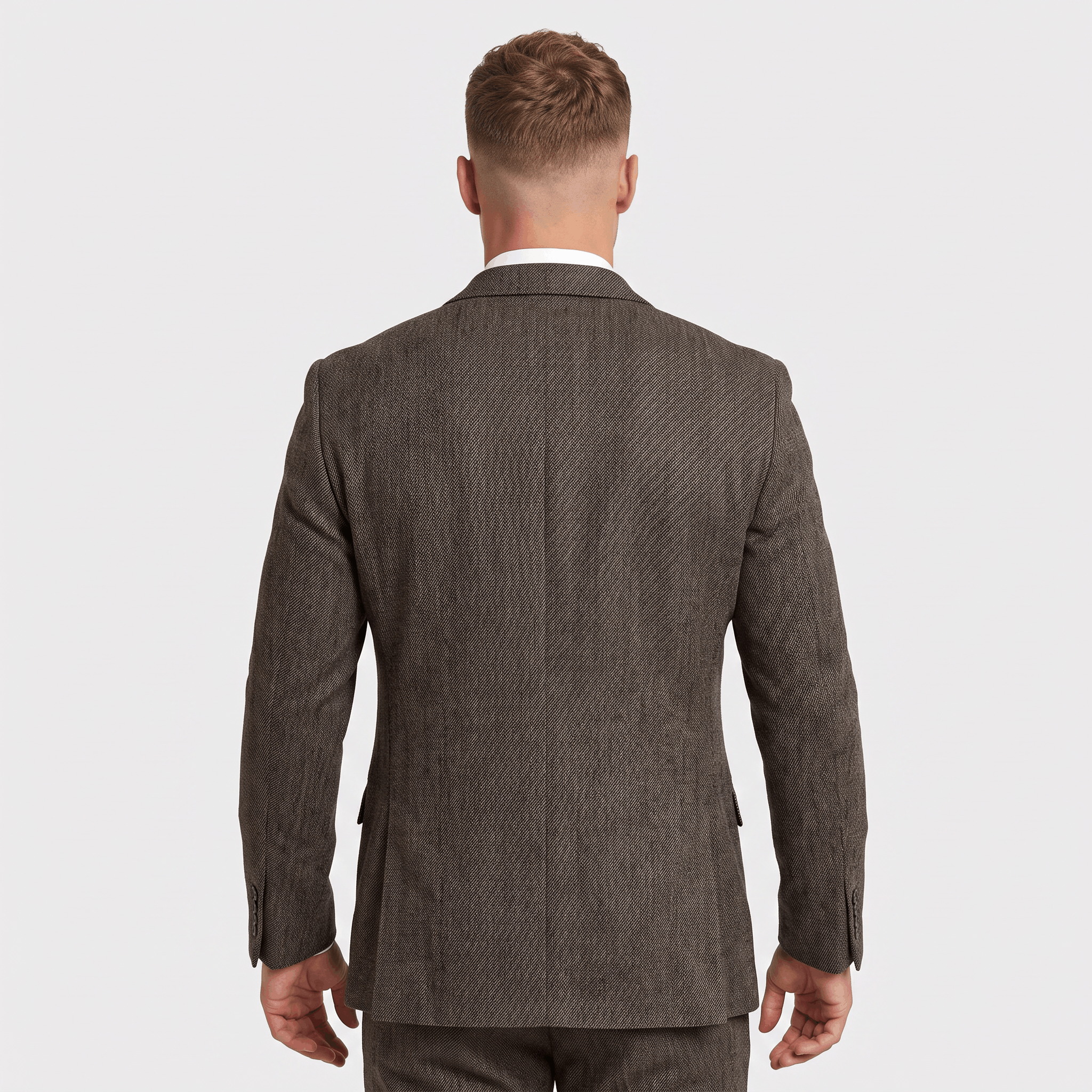 Back view of a men's gray tweed blazer featuring a tailored fit and classic structured design.