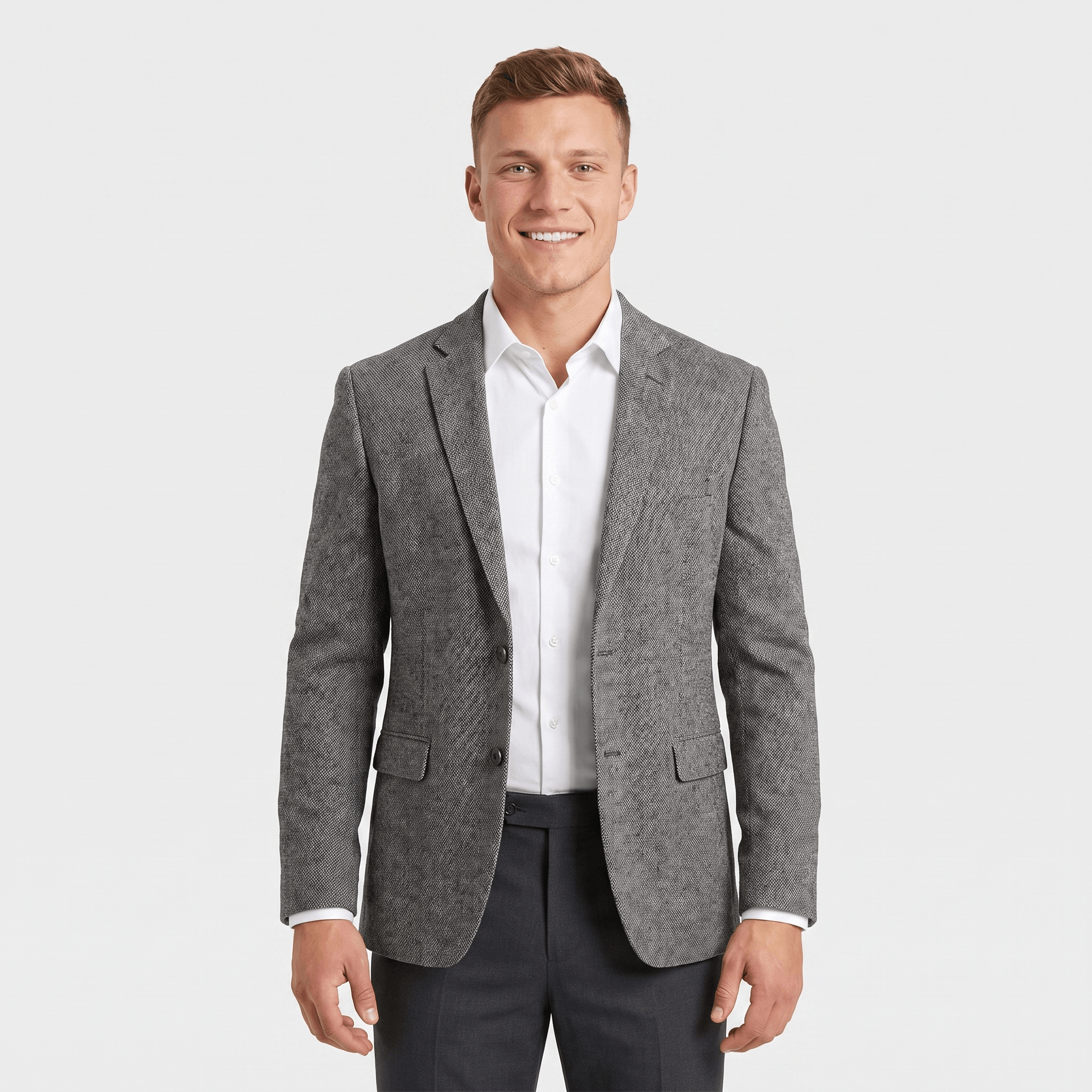 an wearing a gray tweed blazer over a white dress shirt with a tailored fit and classic notched lapel.