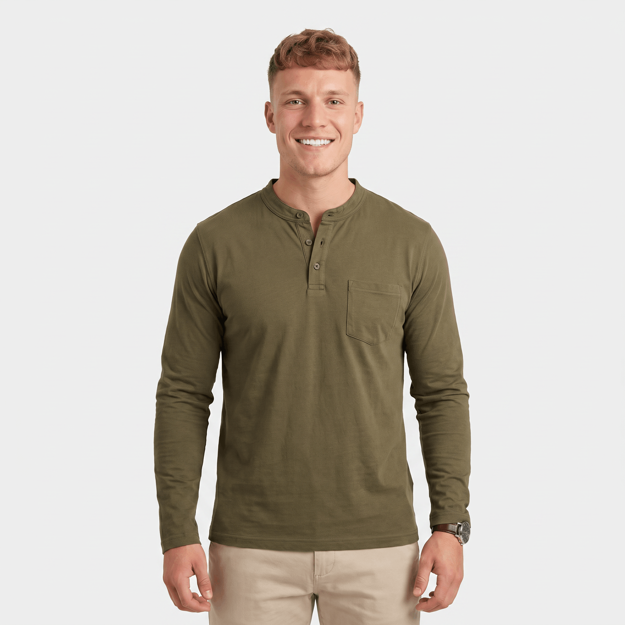 Man wearing an olive green long-sleeve Henley shirt with a three-button placket, chest pocket, and comfortable everyday fit.