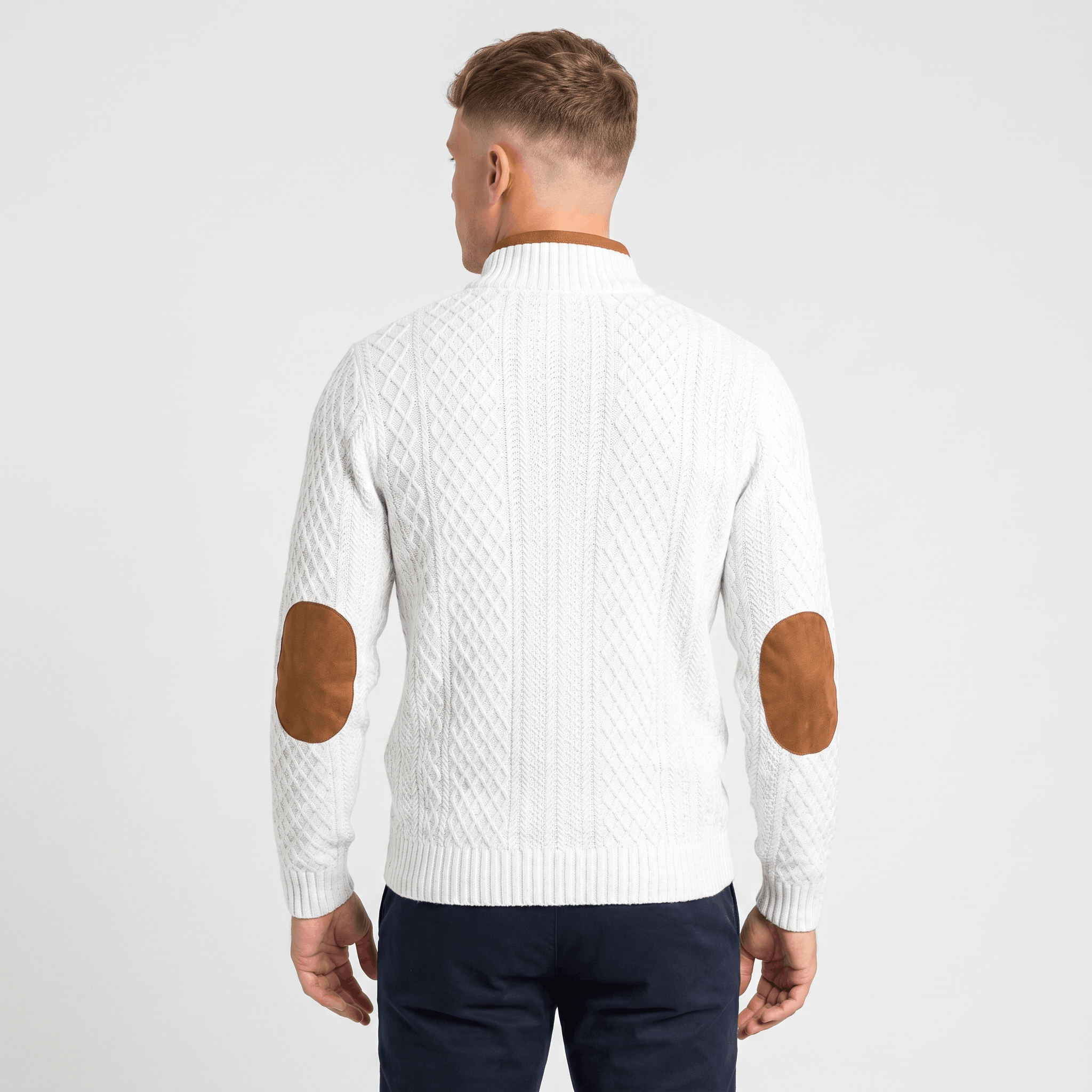 Back view of a men's white cable knit Henley sweater with faux suede elbow patches, ribbed hem, and long sleeves.