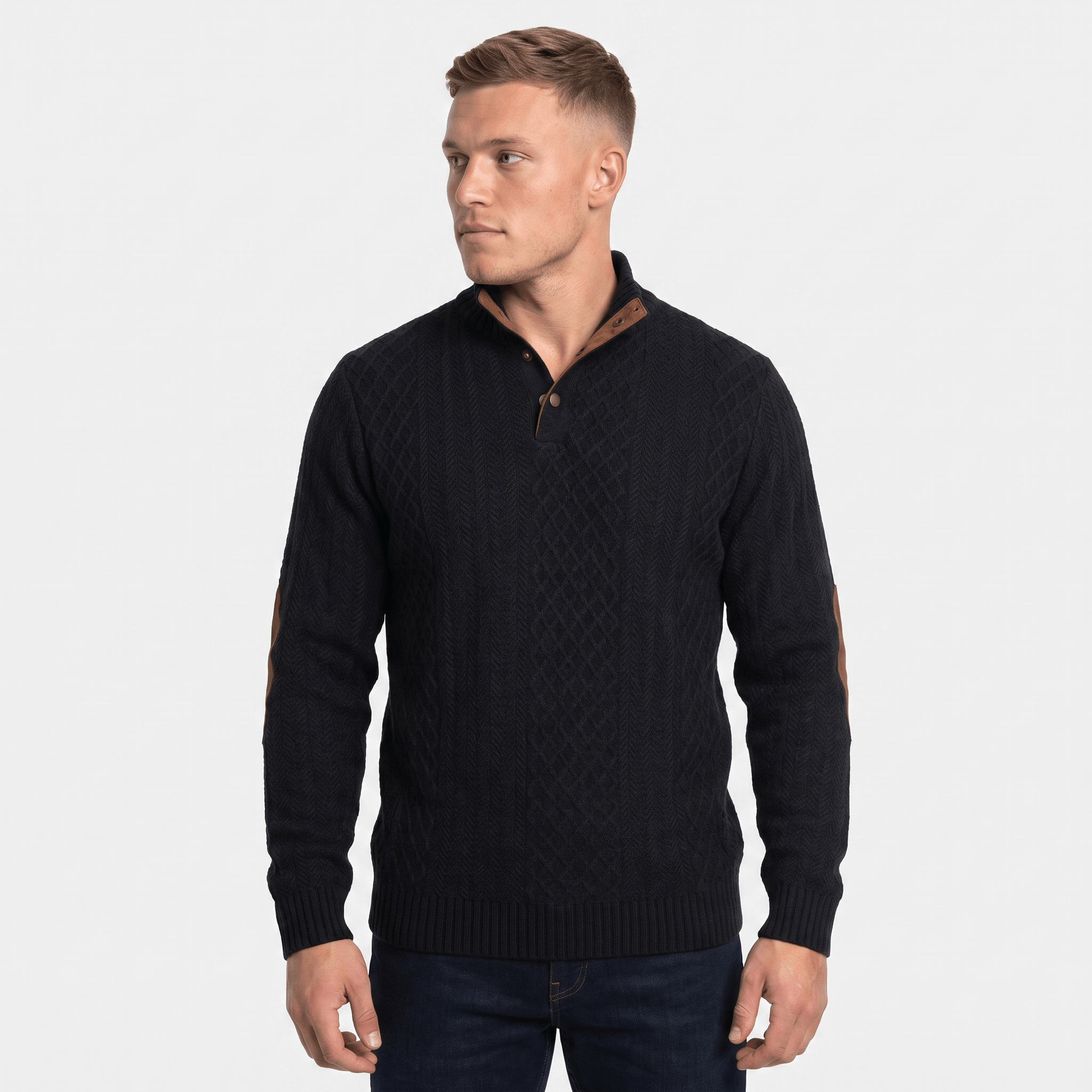 Man wearing a black cable knit Henley sweater with a stand collar, button placket, faux suede collar trim and elbow patches, long sleeves, and a classic fit.