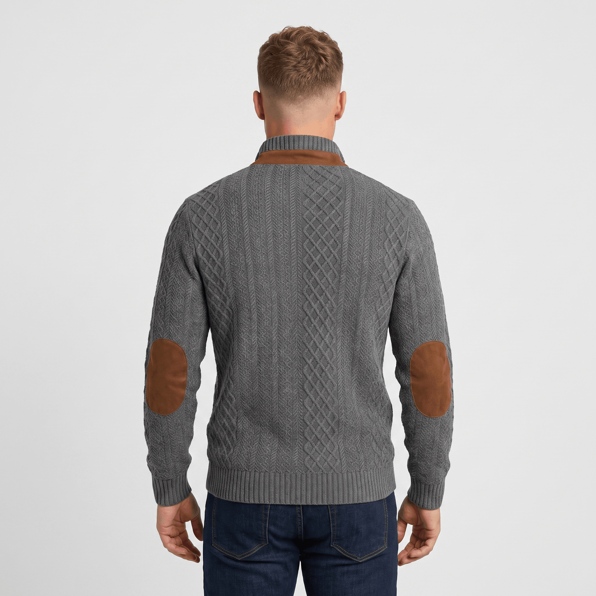 Back view of a men's gray cable knit Henley sweater with faux suede elbow patches and ribbed cuffs.