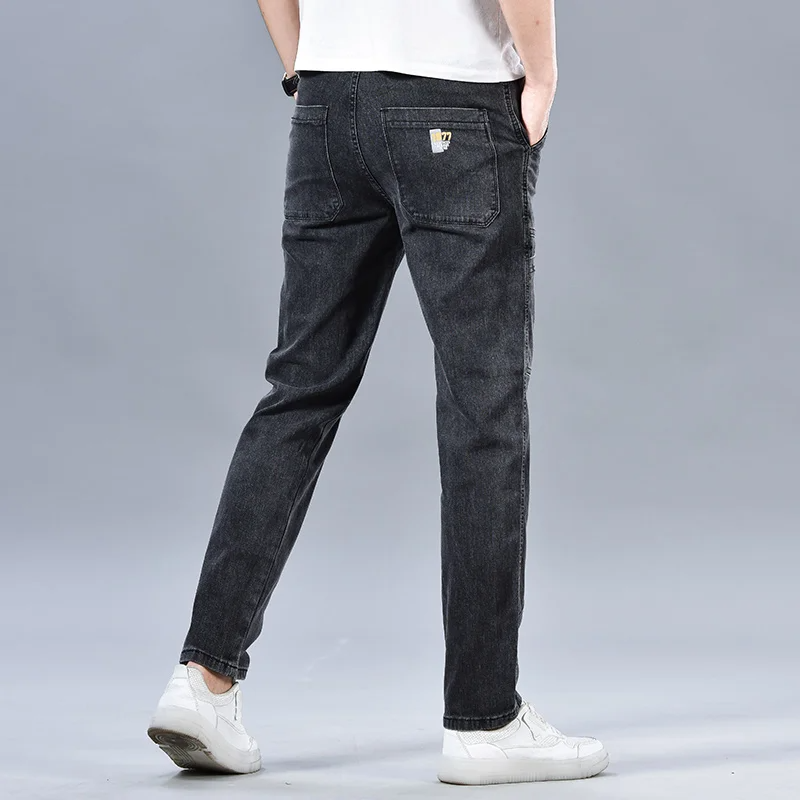 Logan Denim Cargo Pants – Stretch Utility Jeans with Multi-Pocket Design & Tapered Fit